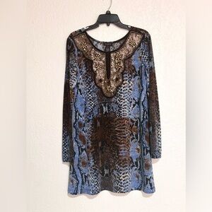 Very beautiful blouse with embellishing adds.